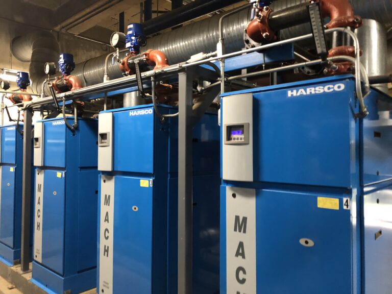 high efficiency Cast Aluminum condensing boilers and a custom PLC based control panel